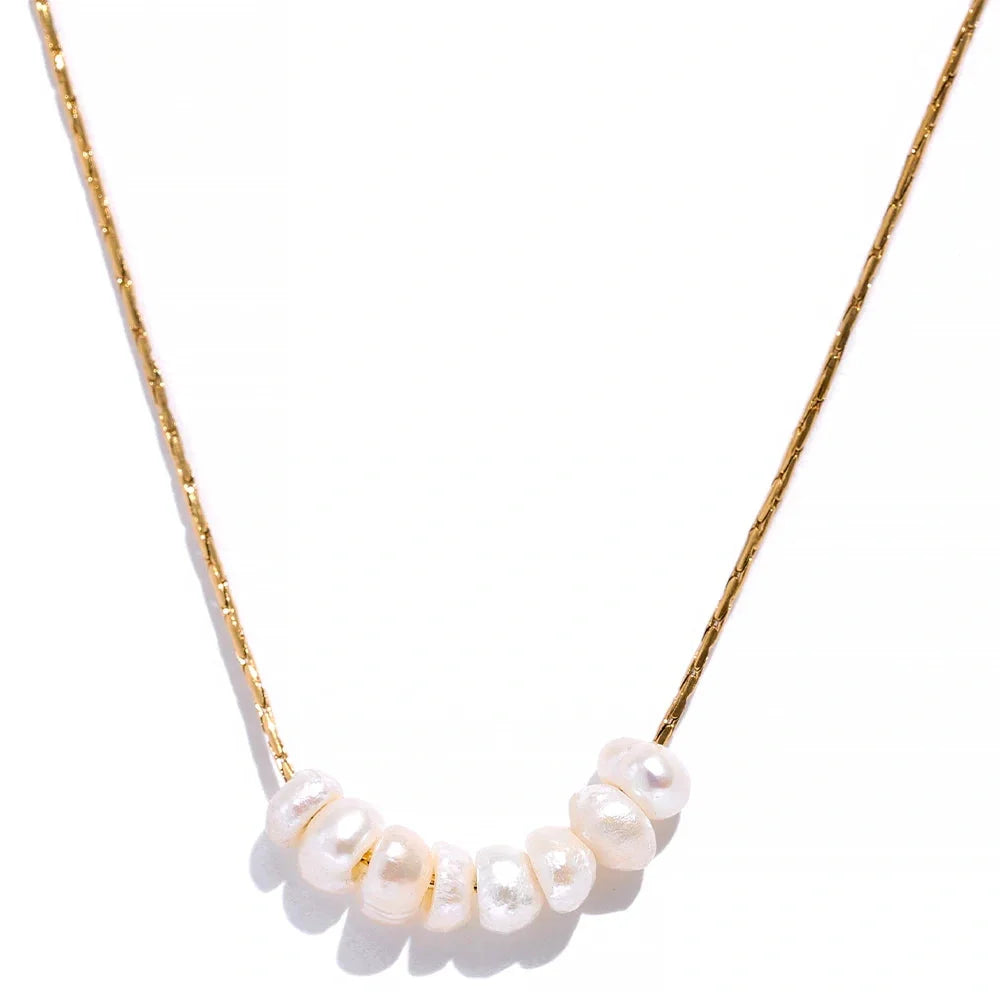 Minimal Me Essentials gold-tone necklace with bezel-set zirconia stones and a four-stone pendant