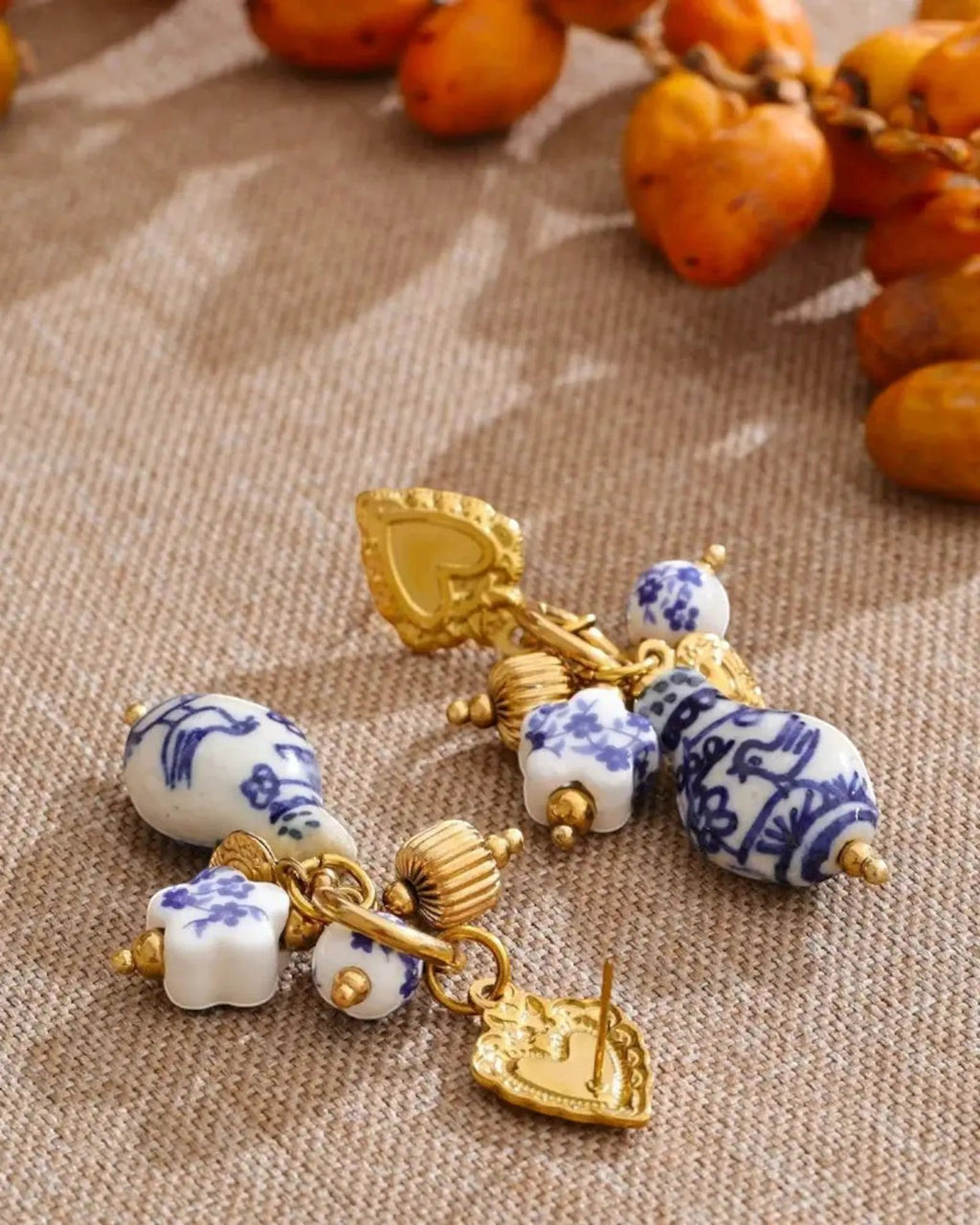 Blue And White Ceramic Flower Heart Drop 18K Gold PVD Plated Stainless Steel Earrings With Gold Charms by Poised Me Jewelry Studio
